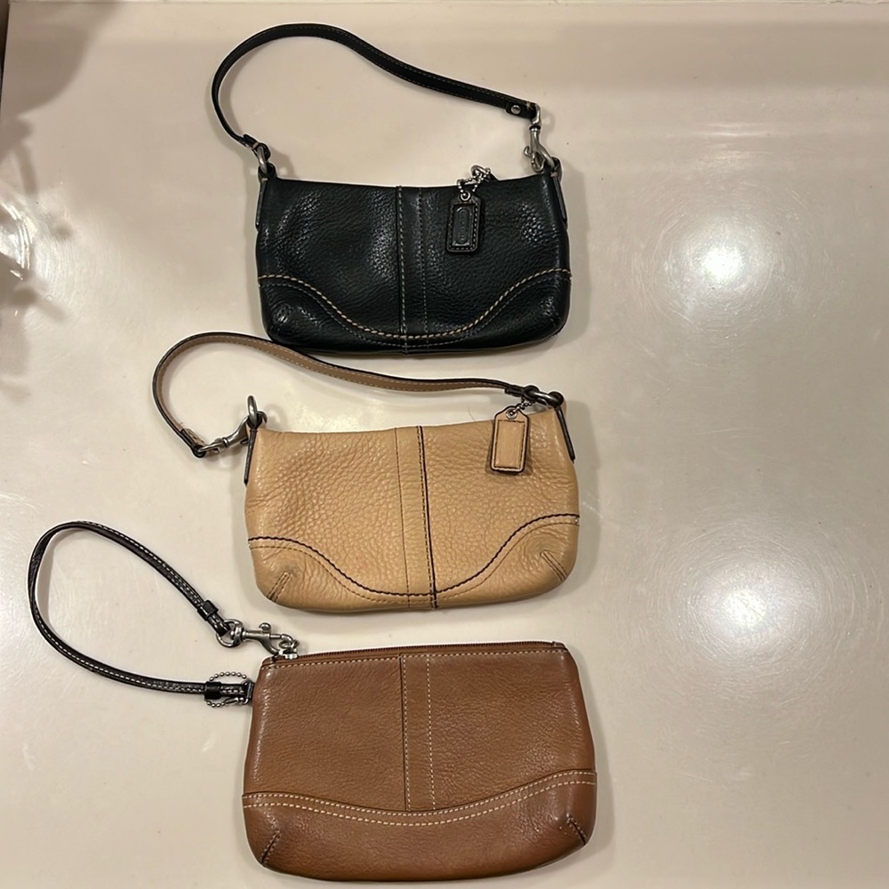 Coach set of 3 wristlets!!! In good condition